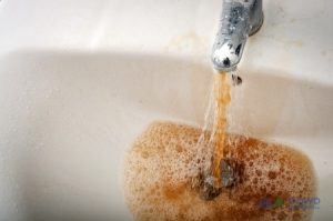 Brown Water Coming Out of a Sink