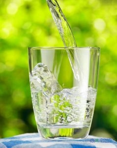 Pouring a Glass of Water Outside