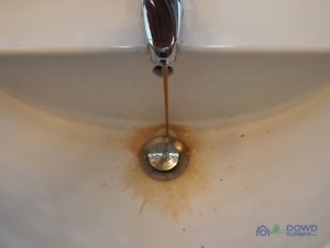 A Sink Dispenses Dirty Water